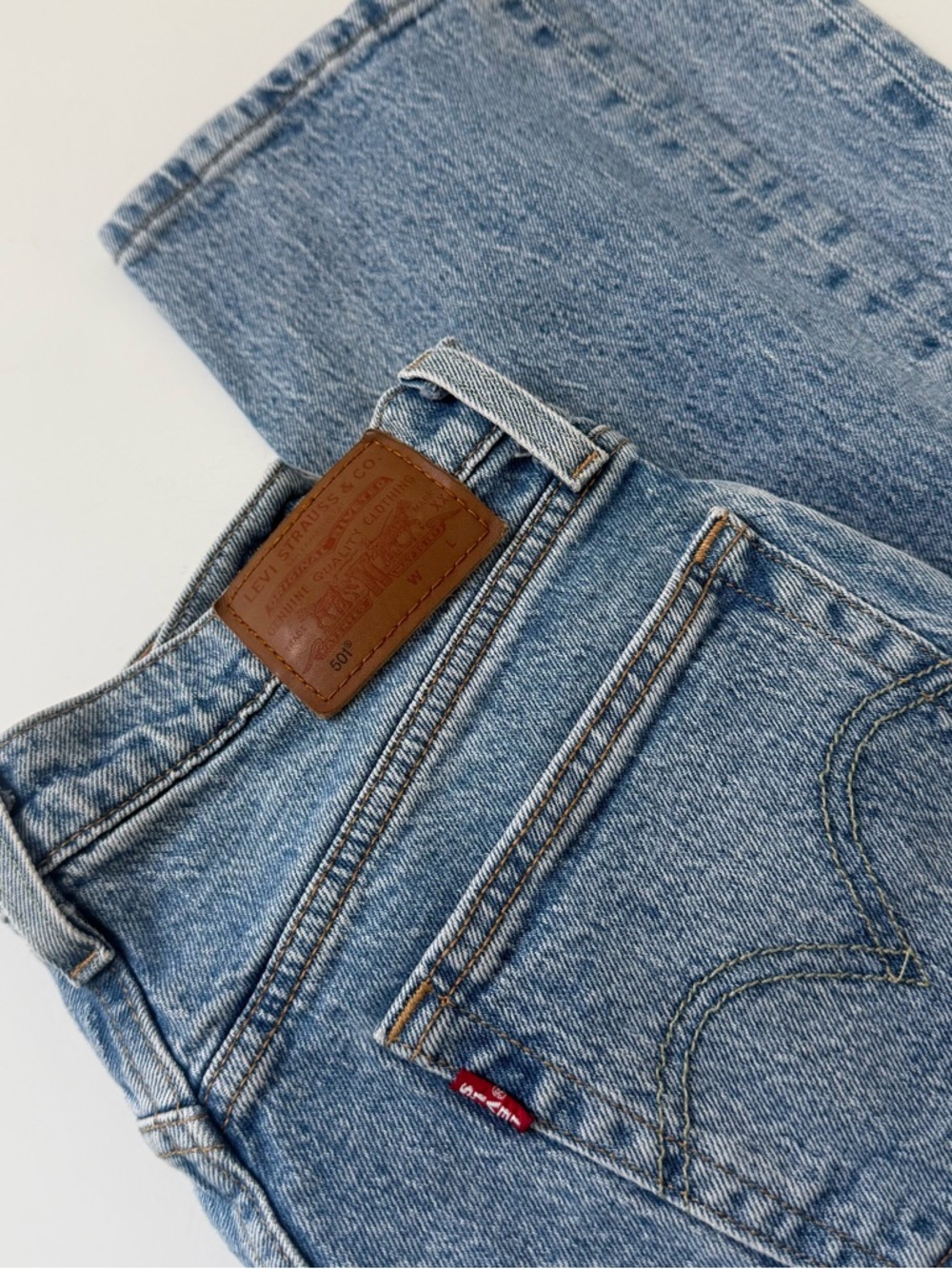 Levi's Light Blue Straight Leg Jeans with Brown Leather Patch
